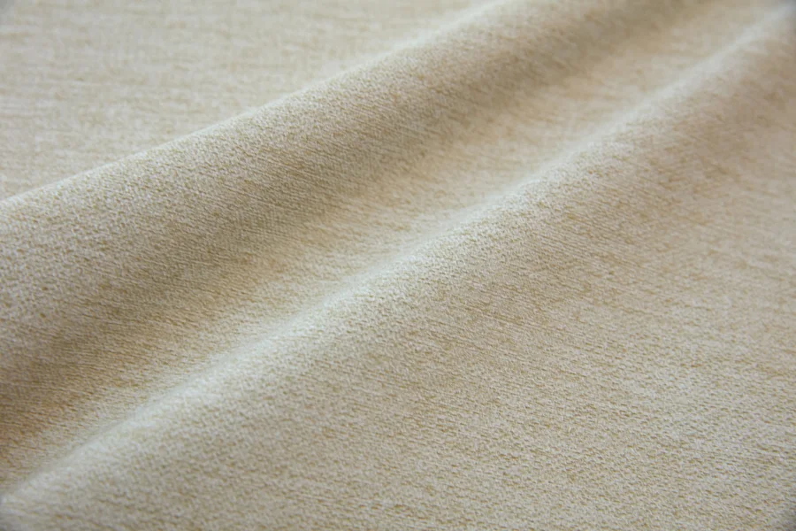 Catalogue 301 shade 301-07, Dusty Yellow — blackout curtain fabric close-up showing the weave and drape
