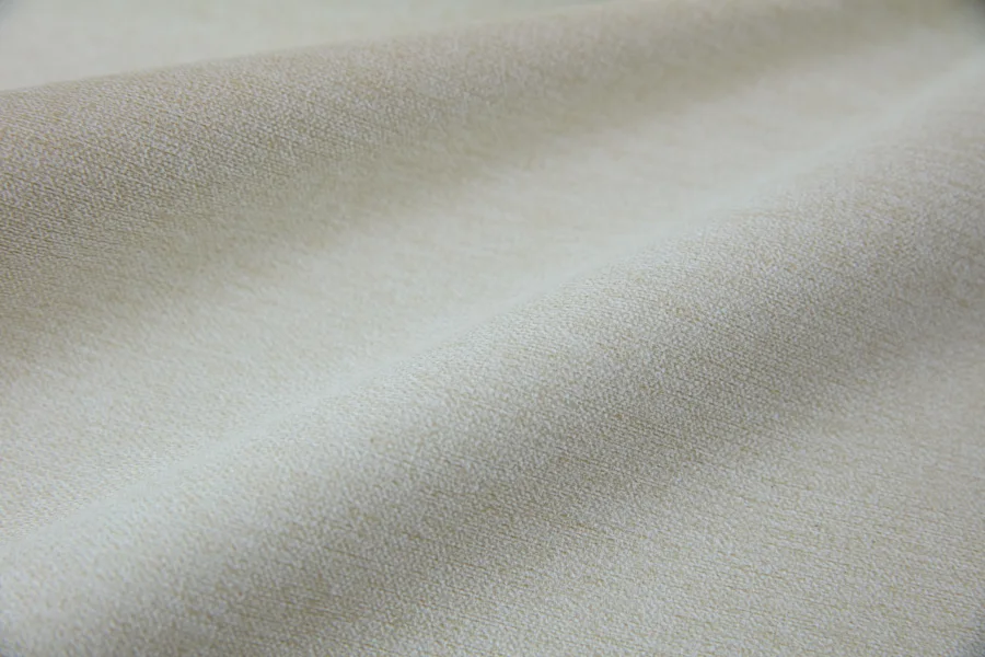 Catalogue 301 shade 301-12, Oat Apricot — blackout curtain fabric close-up showing the weave and drape