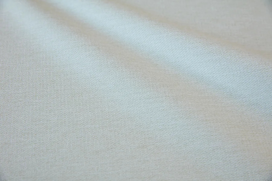 Catalogue 301 shade 301-13, Vanilla Cream — blackout curtain fabric close-up showing the weave and drape