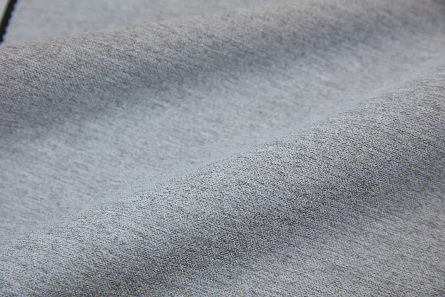 Catalogue 301 shade 301-19, Greige — blackout curtain fabric close-up showing the weave and drape