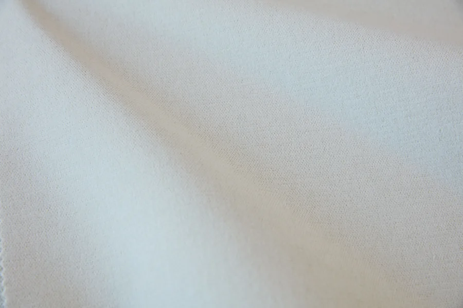 Catalogue 302 shade 302-04, Dove Grey — blackout curtain fabric close-up showing the weave and drape