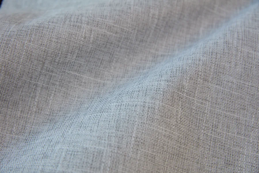 Catalogue 303 shade 303-10, Light Gray — blackout curtain fabric close-up showing the weave and drape