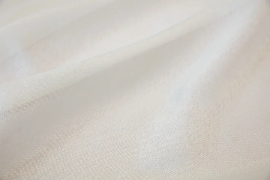 Catalogue 401 shade 401-08, Off White Sable — chiffon sheer curtain fabric close-up showing the weave and drape