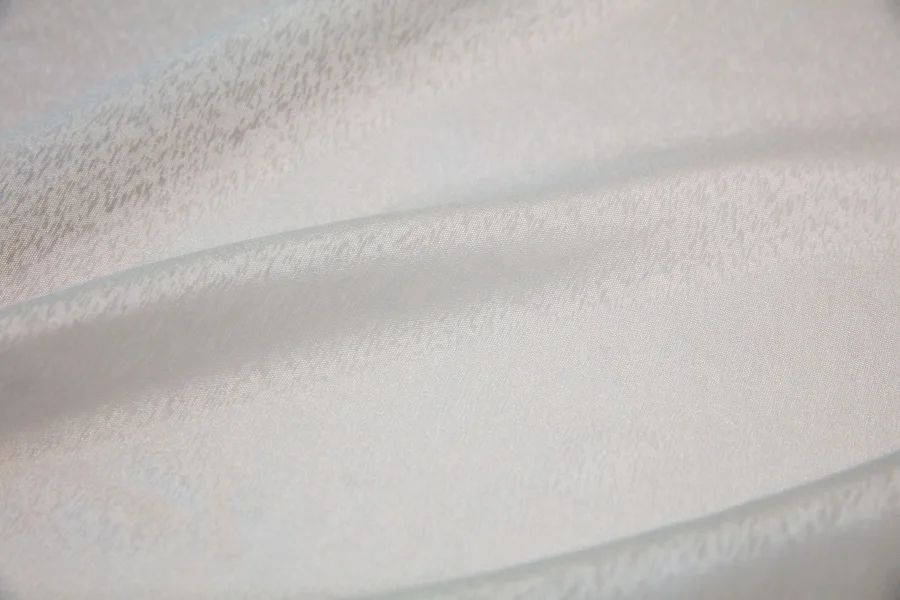 Catalogue 401 shade 401-11, Dark Beige TTL Sable — chiffon sheer curtain fabric close-up showing the weave and drape