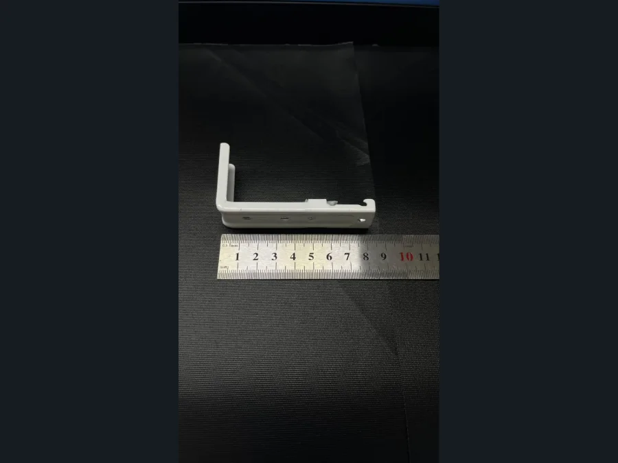 Right-angle white wall bracket for a curtain track