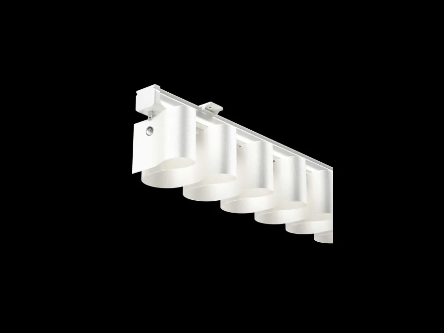 White aluminium curtain track with a ceiling bracket and runners